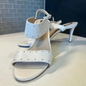 Gently worn DKNY off-white 3” heels size 10 with silver metal accents